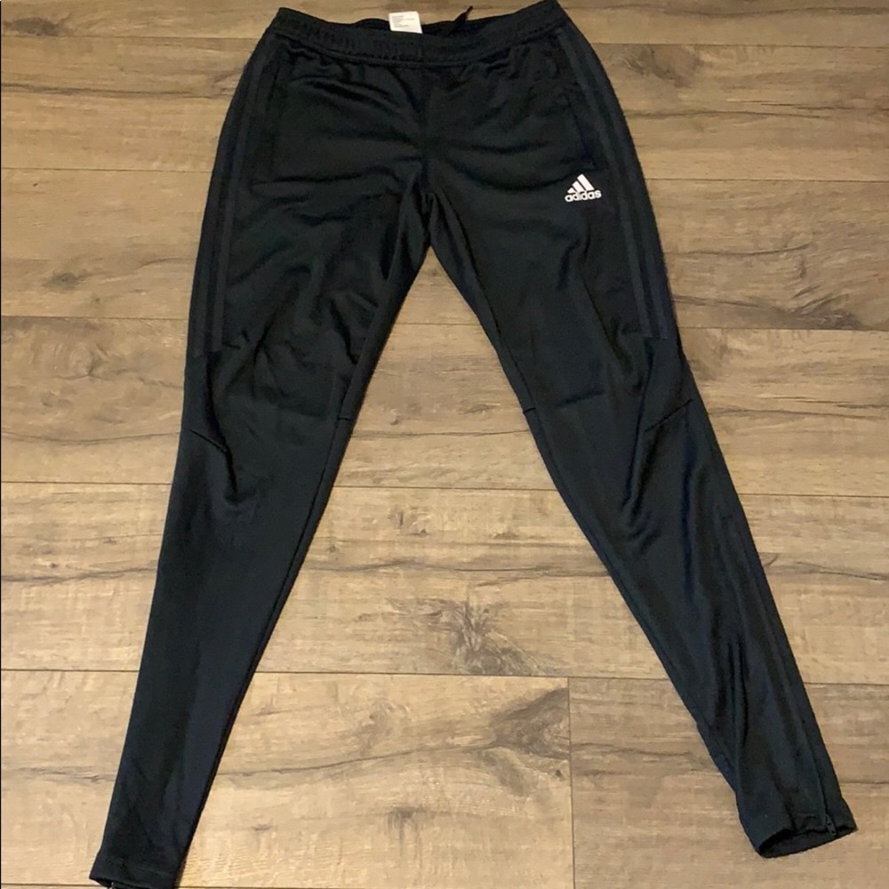 A pair of men’s adidas soccer/ football sweats